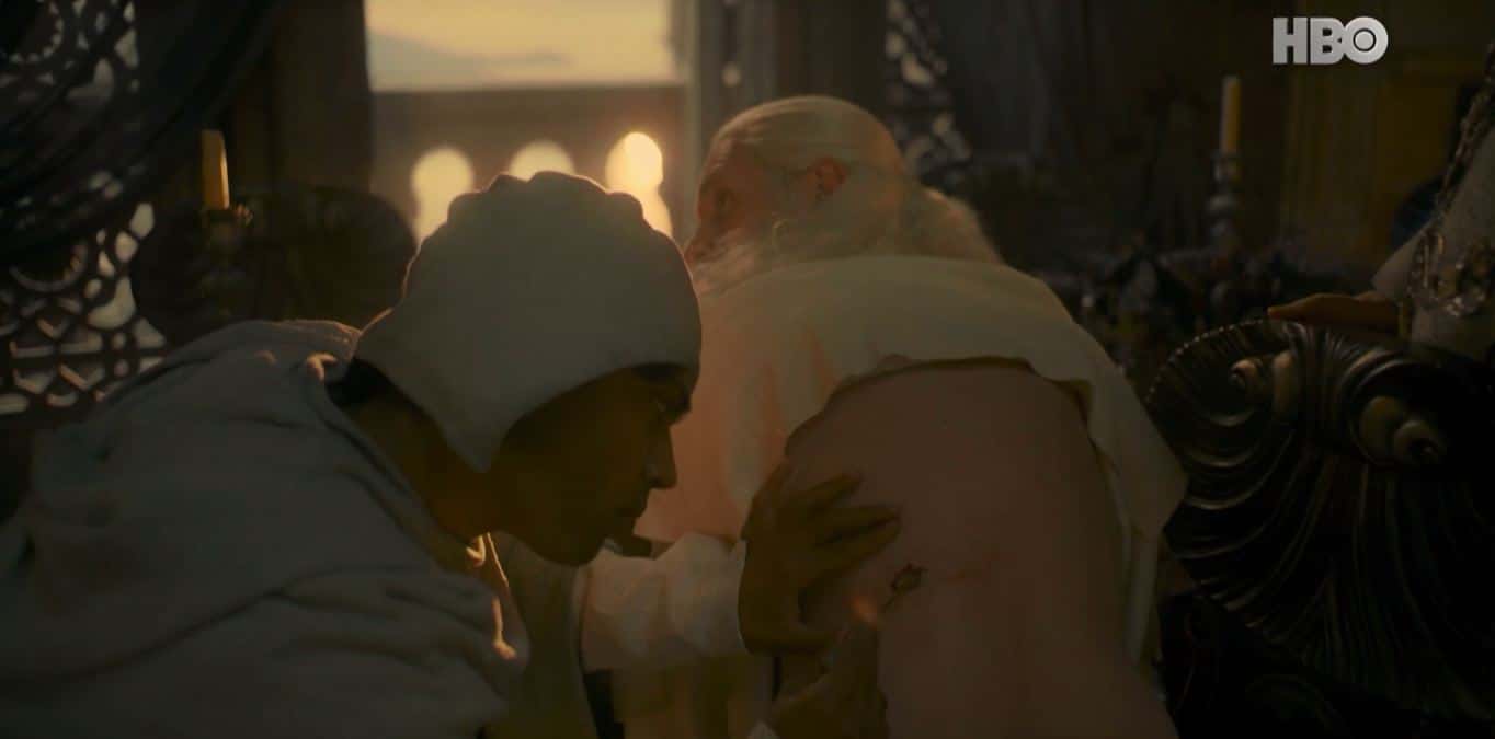 King Viserys I Targaryen (Paddy Considine) getting checked for an injury in 'House of the Dragon' (HBO)