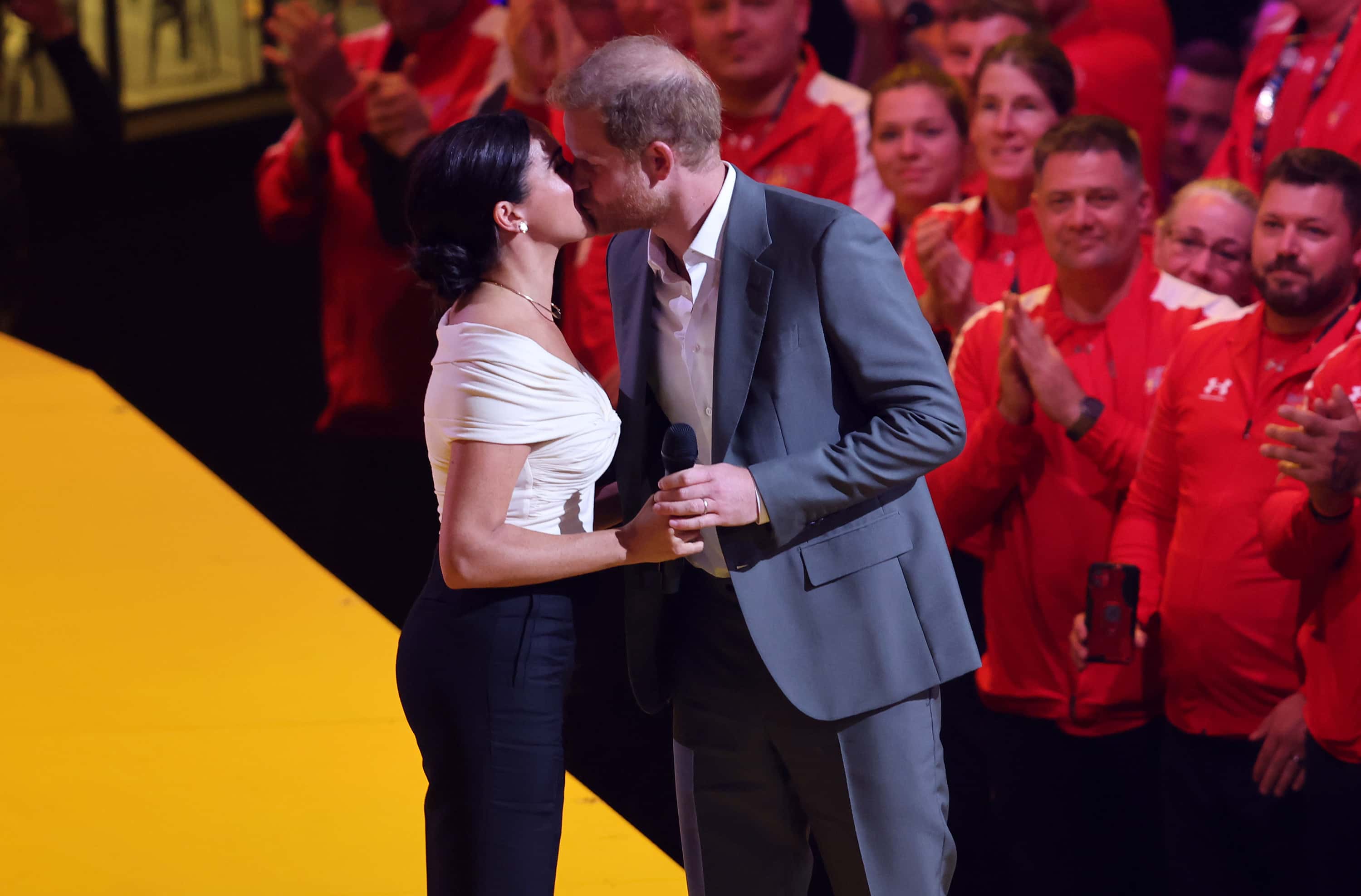 Meghan, Duchess of Sussex and Prince Harry, Duke of Sussex appear on stage during the Invictus Games The Hague 2020 Opening Ceremony at Zuiderpark on April 16, 2022 in The Hague, Netherlands.