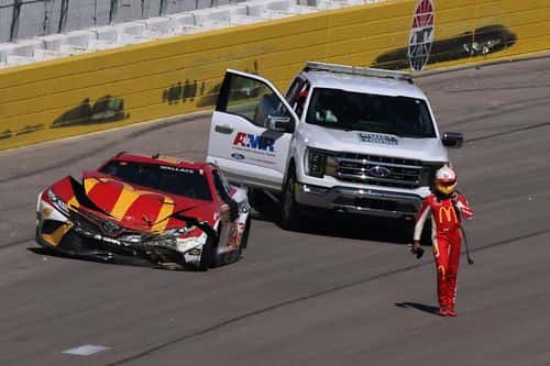 Bubba Wallace, driver of the #45 McDonald's Toyota, exits his car after an on-track incident during the NASCAR Cup Series South Point 400 at Las Vegas Motor Speedway on October 16, 2022 in Las Vegas, Nevada.