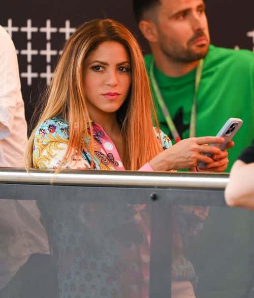 Shakira texts on his mobile phone as she watches the action during the F1 Grand Prix of Spain at Circuit de Barcelona-Catalunya on June 04, 2023 in Barcelona, Spain.