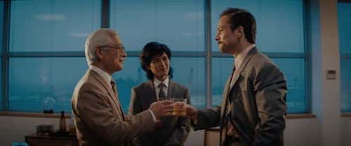 Taron Edgerton (Henk Rogers) and Togo Igawa (Hiroshi Yamauchi) in a still from 'Tetris' (Apple TV+)