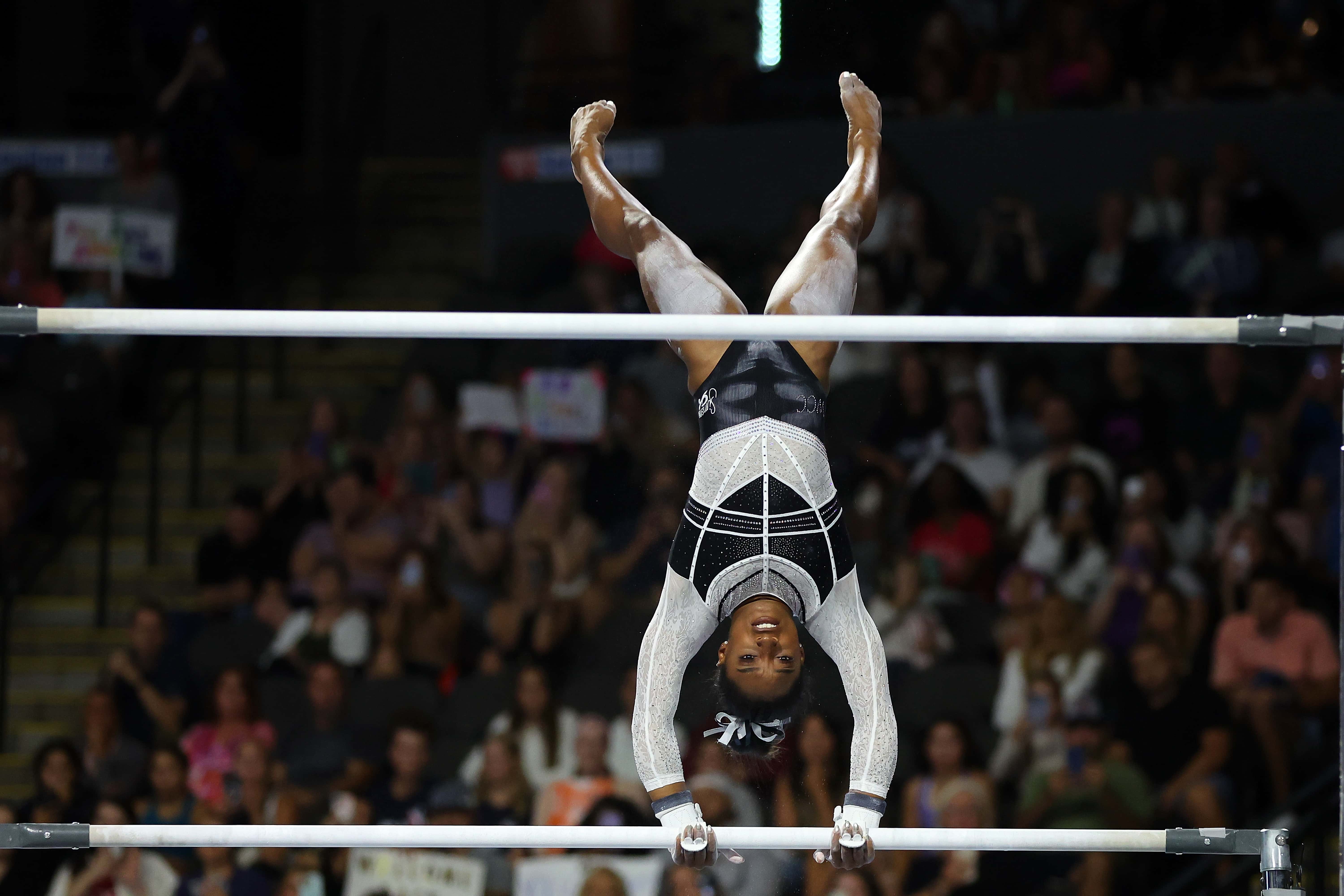 Simone Biles competes in the uneven bars during the Core Hydration Classic at Now Arena on August 05, 2023, in Hoffman Estates, Illinois. (Stacy Revere/Getty Images)