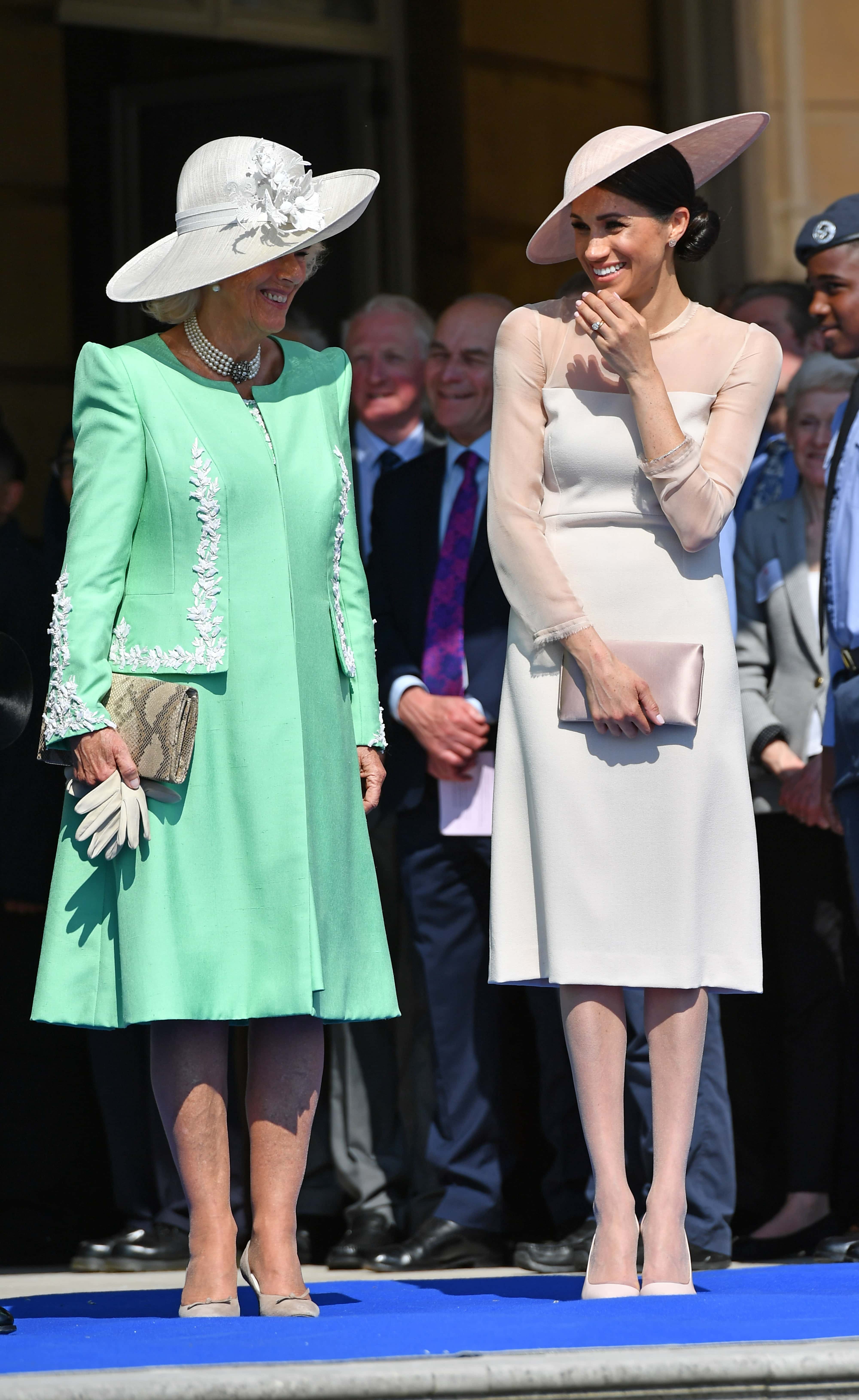 Camilla, Duchess of Cornwall and Meghan, Duchess of Sussex attend The Prince of Wales' 70th Birthday Patronage Celebration held at Buckingham Palace on May 22, 2018 in London, England.