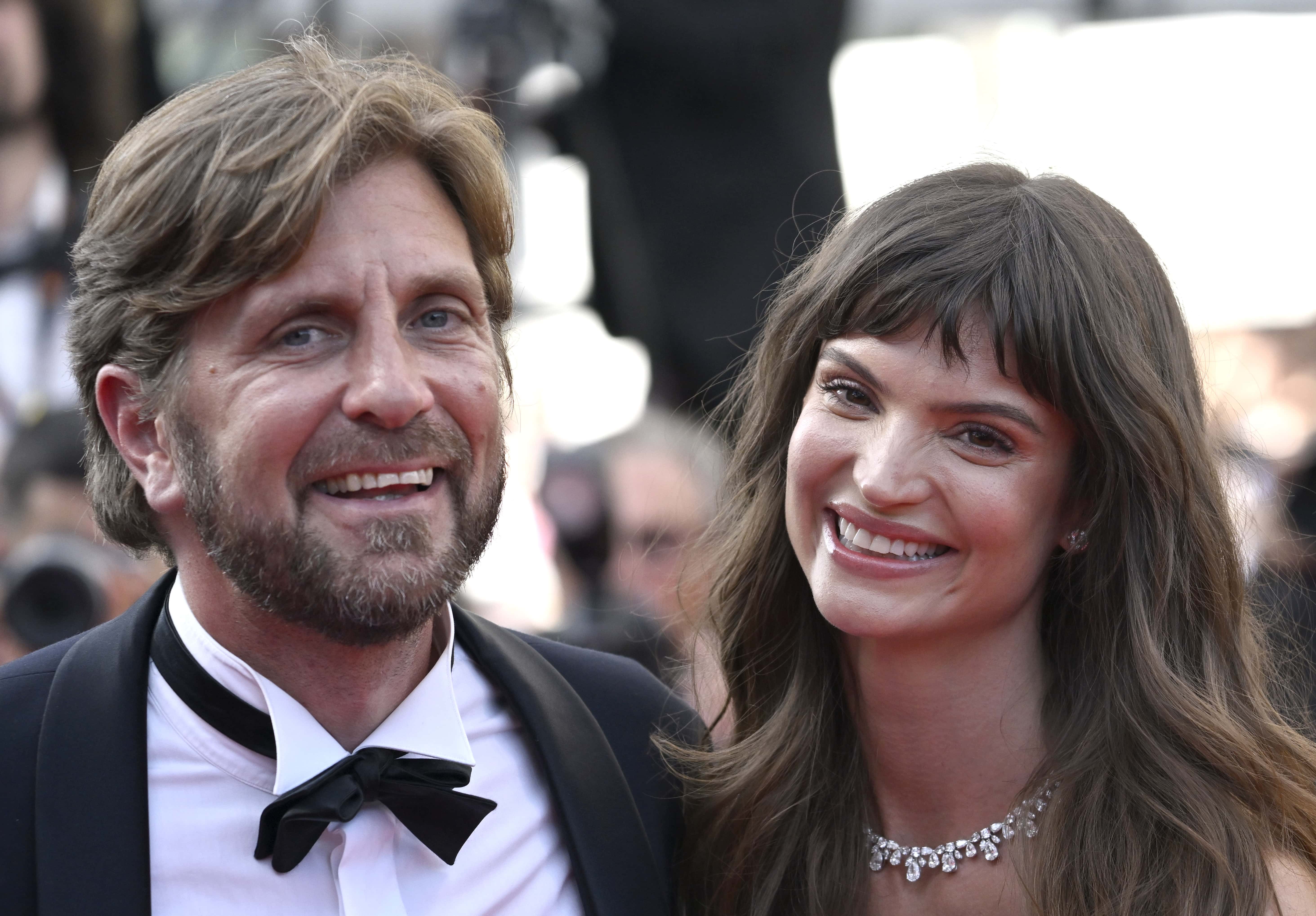 Director Ruben Ostlund and Charlbi Dean Kriek attend the screening of