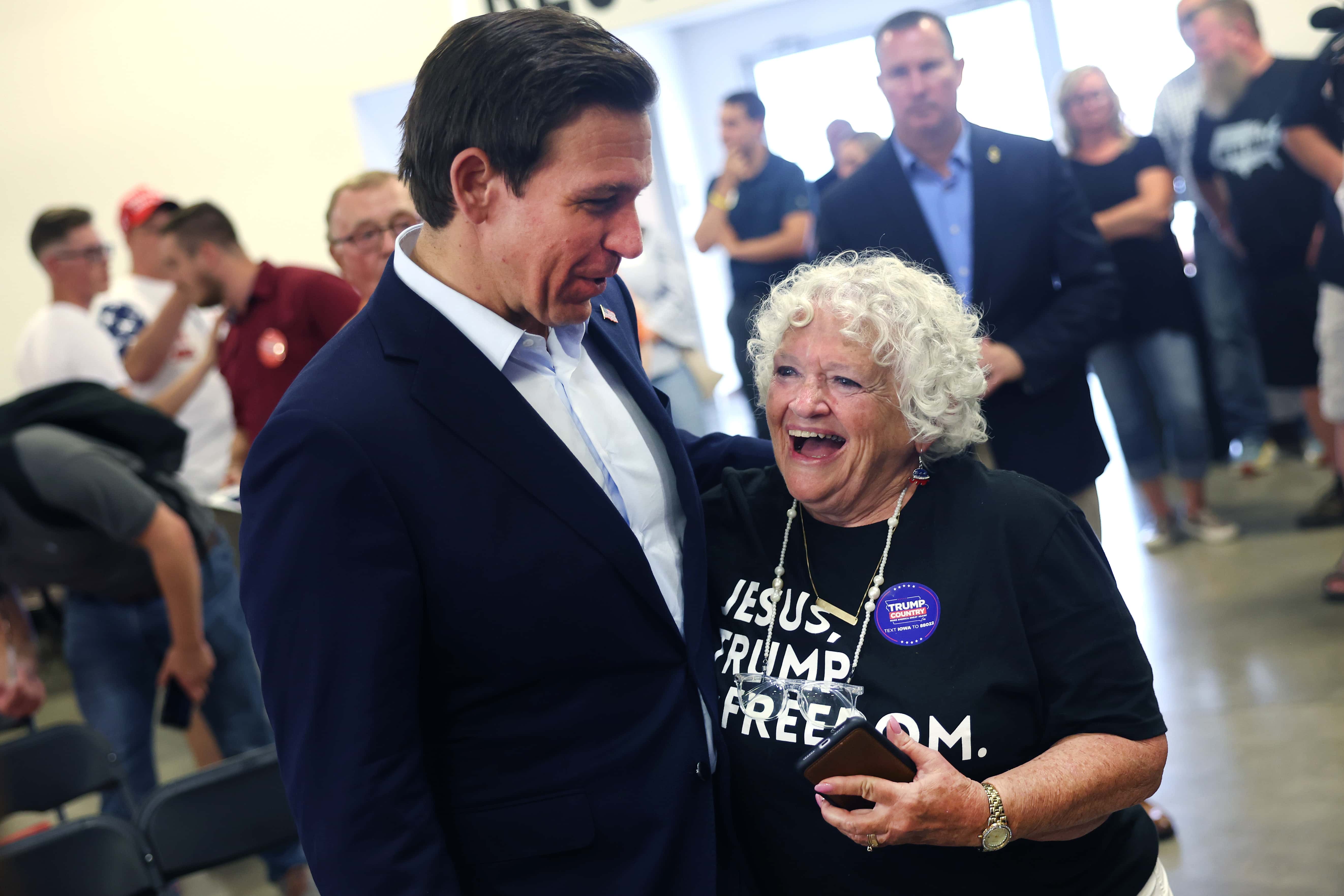 CEDAR RAPIDS, IOWA - AUGUST 06: Republican presidential candidate Florida Governor Ron DeSantis greets guests at Ashley's BBQ Bash hosted by Congresswoman Ashley Hinson (R-IA) on August 06, 2023 in Cedar Rapids, Iowa. Seven of the 14 GOP candidates seeking the party's nomination for president were scheduled to speak at the event. (Photo by Scott Olson/Getty Images)
