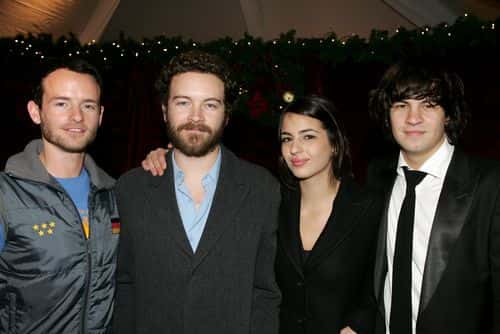 (L-R) Brothers and sister Chris Masterson, Danny Masterson, Alanna Masterson and Jordan Masterson pose backstage during the Church of Scientology's Christmas Stories XIV 
