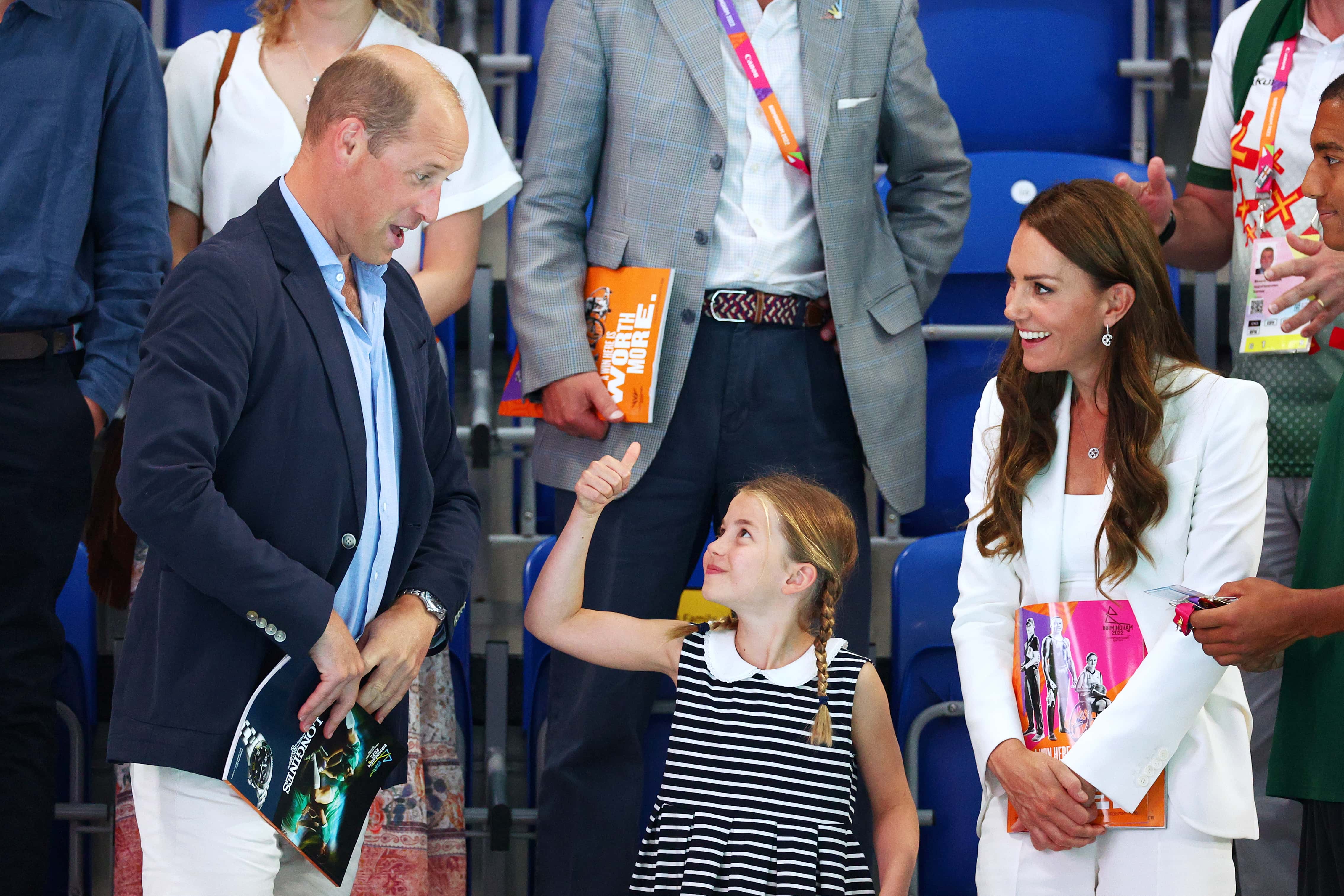 Prince William, Duke of Cambridge, Princess Charlotte and Catherine, Duchess of Cambridge watch the action on day five of the Birmingham 2022 Commonwealth Games at Sandwell Aquatics Centre on August 02, 2022 in Smethwick, England.