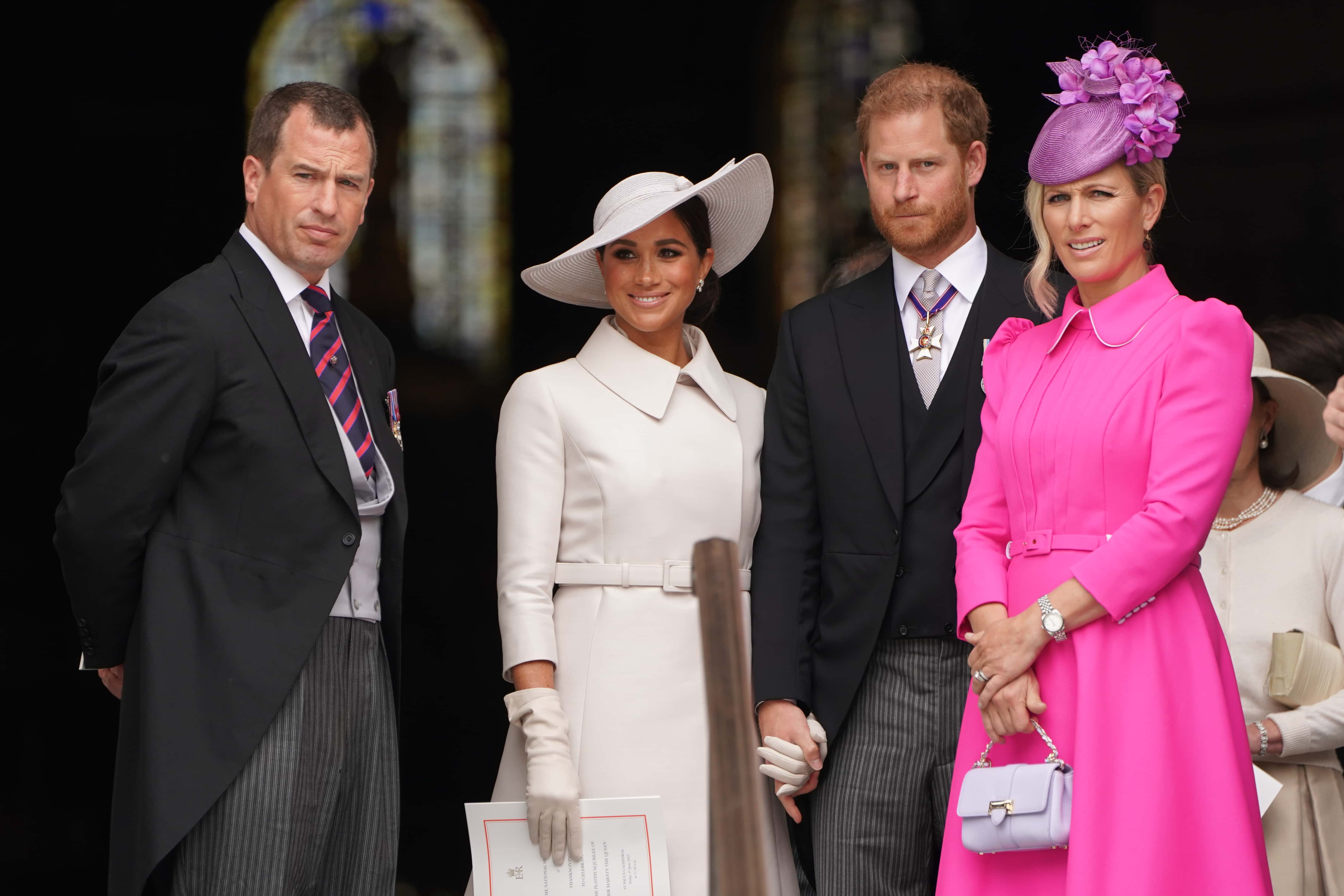 (L-R) Peter Phillips, Meghan, Duchess of Sussex, Prince Harry, Duke of Sussex and Zara Tindall leave after the National Service of Thanksgiving to Celebrate the Platinum Jubilee of Her Majesty The Queen at St Paul's Cathedral on June 3, 2022 in London, England. The Platinum Jubilee of Elizabeth II is being celebrated from June 2 to June 5, 2022, in the UK and Commonwealth to mark the 70th anniversary of the accession of Queen Elizabeth II on 6 February 1952.