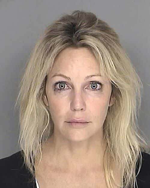 In this handout image provided by the Santa Barbara County Sheriff's Dept., actress Heather Locklear poses for a mugshot September 28, 2008 in Santa Barbara, California. Locklear was arrested on suspicion of driving under the influence of a controlled substance in the Santa Barbara area, authorities said Sunday.
