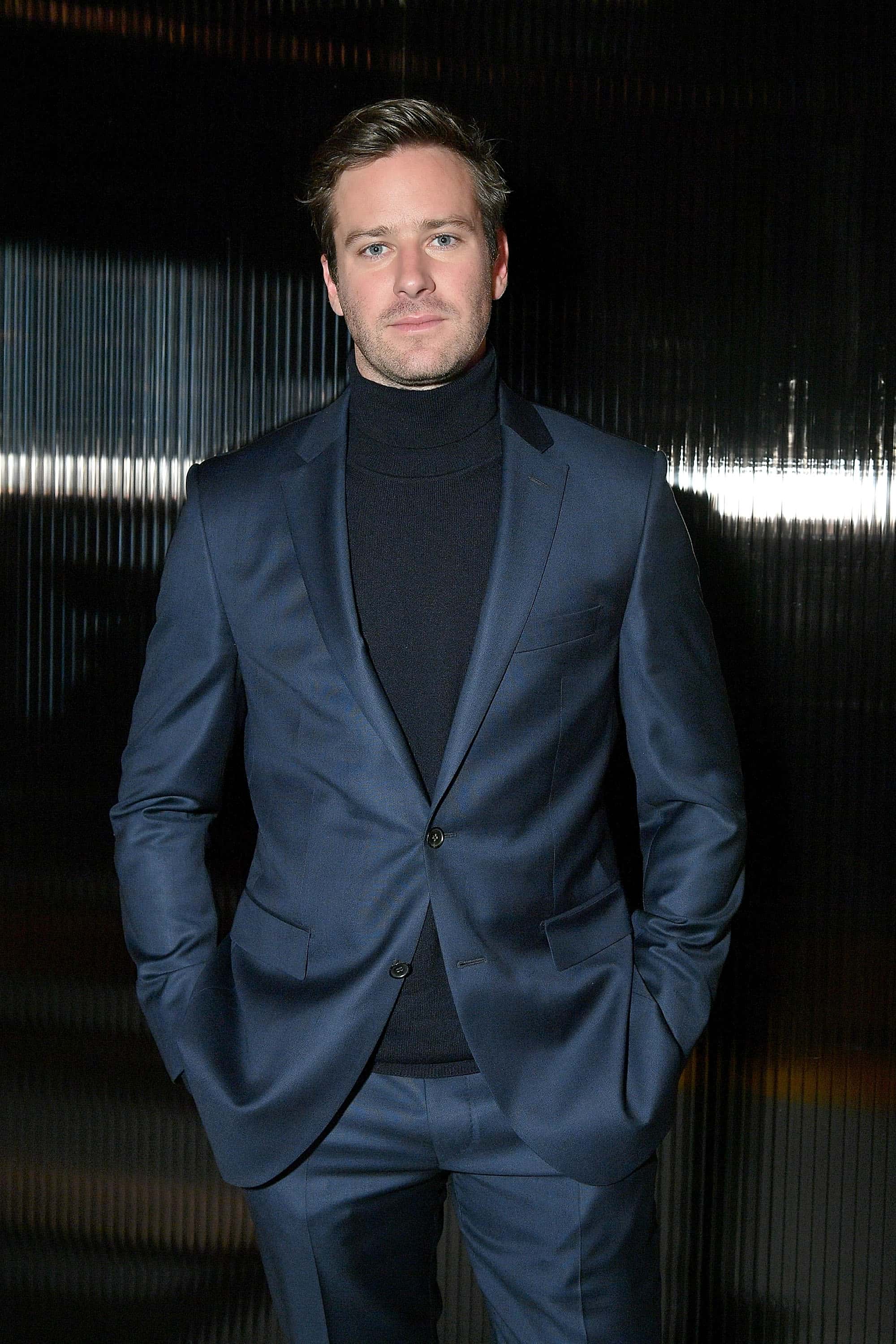 Actor Armie Hammer poses for a photo at BOSS Menswear - Front Row at New York Fashion Week Mens' on February 7, 2018 in New York City.