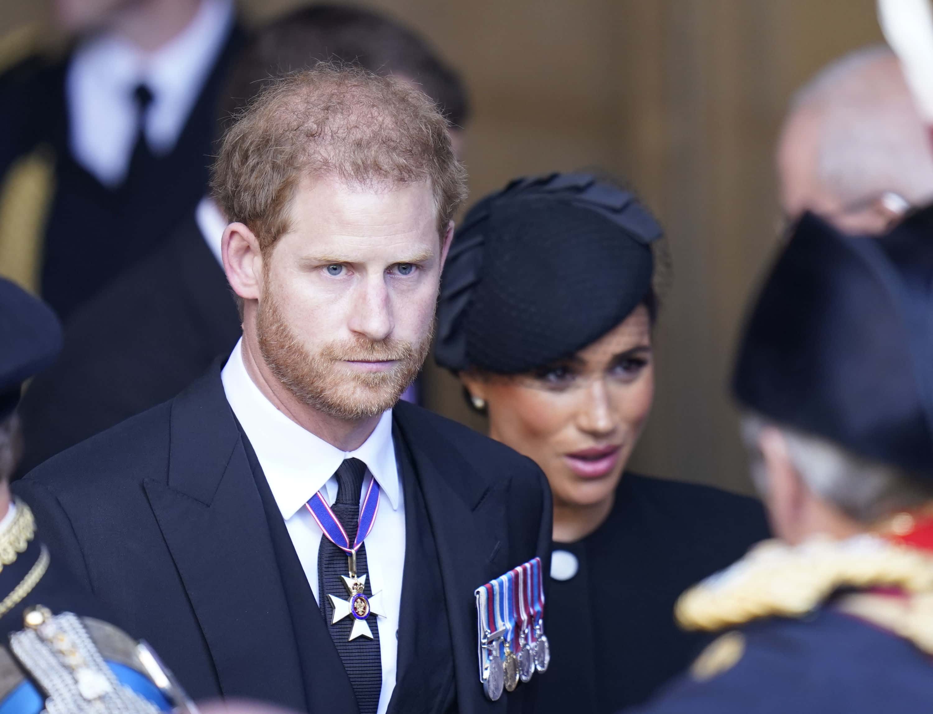 Prince Harry and Meghan, Duchess of Sussex leave Westminster Hall, London after the coffin of Queen Elizabeth II was brought to the hall to lie in state ahead of her funeral on Monday on September 14, 2022 in London, England. Queen Elizabeth II's coffin is taken in procession on a Gun Carriage of The King's Troop Royal Horse Artillery from Buckingham Palace to Westminster Hall where she will lay in state until the early morning of her funeral. Queen Elizabeth II died at Balmoral Castle in Scotland on September 8, 2022, and is succeeded by her eldest son, King Charles III.