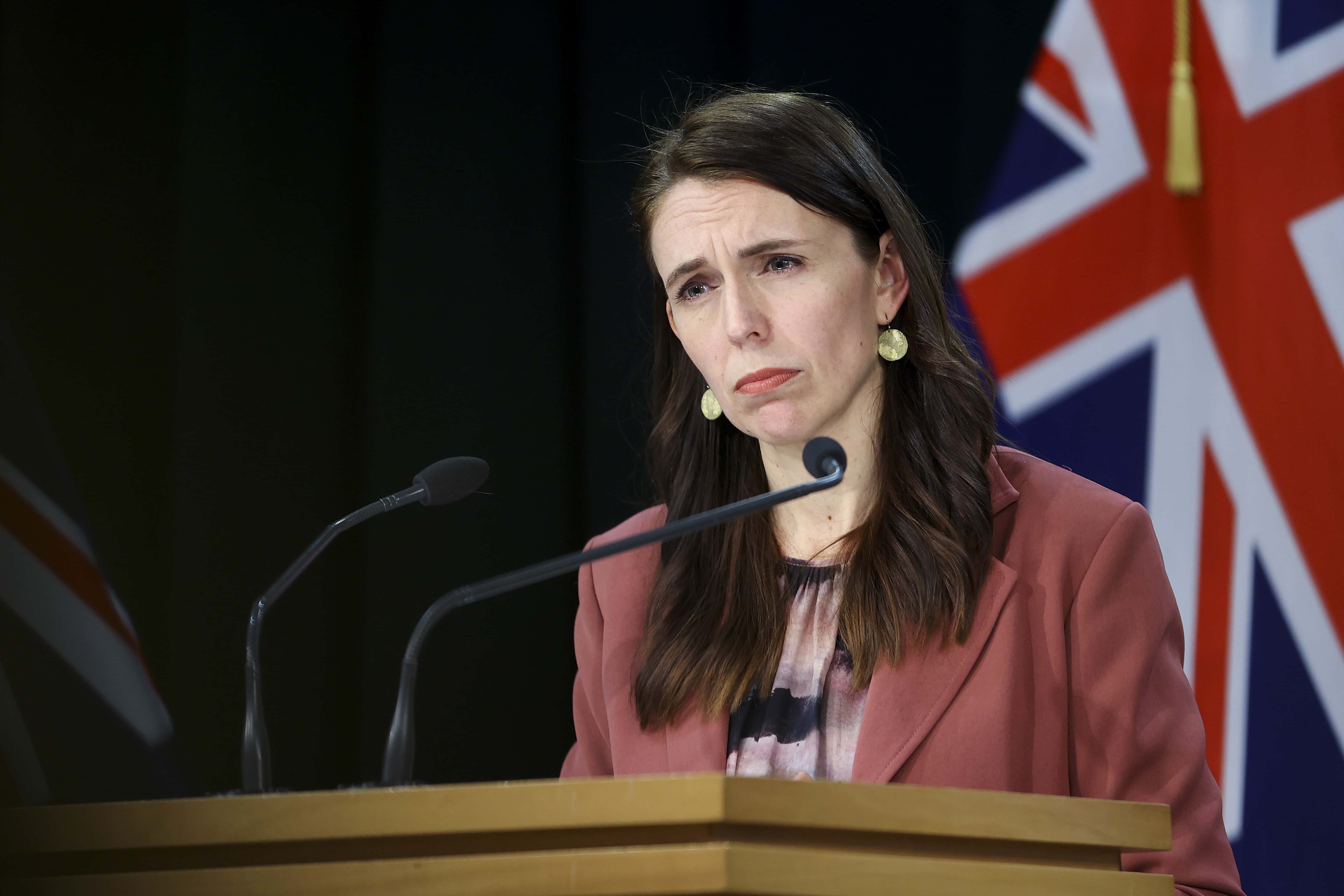 Prime Minister Jacinda Ardern looks on during a press conference at Parliament on August 17, 2021 in Wellington, New Zealand. Auckland and Coromandel will go into level-4 lockdown for seven days - and the rest of the country for three days - after a positive COVID-19 case was confirmed in the community in Auckland. The lockdown restrictions will come into effect at 11:59 tonight. The person traveled to Coromandel over the weekend. New Zealand health officials are investigating the source of the new positive COVID-19 case and are yet to confirm whether it is the highly contagious Delta variant of the coronavirus. The last case of community transmission was reported in New Zealand on February 28 2021.