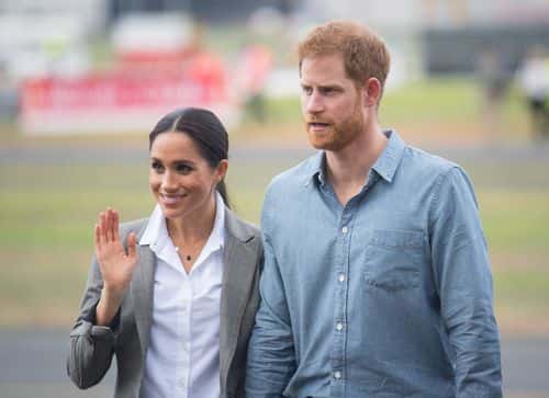 Meghan, Duchess of Sussex and Prince Harry, Duke of Sussex attend a naming and unveiling ceremony for the new Royal Flying Doctor Service aircraft at Dubbo Airport on October 17, 2018 in Dubbo, Australia. The Duke and Duchess of Sussex are on their official 16-day Autumn tour visiting cities in Australia, Fiji, Tonga and New Zealand. (Photo by Dominic Lipinski - Pool/Getty Images)
