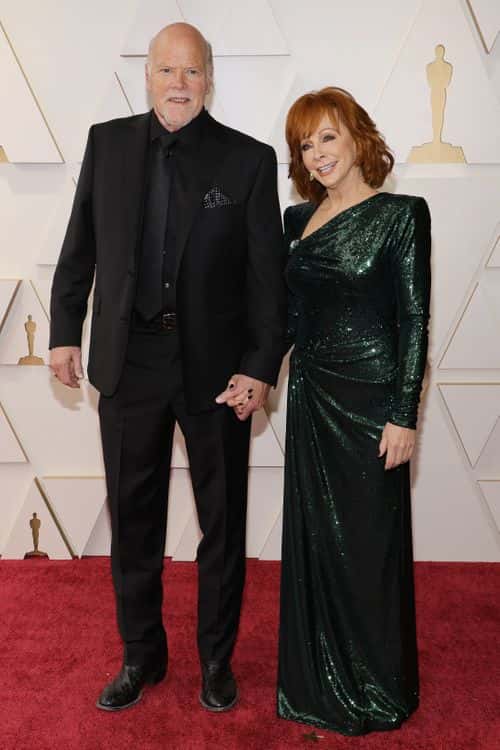 (L-R) Rex Linn and Reba McEntire attends the 94th Annual Academy Awards at Hollywood and Highland on March 27, 2022 in Hollywood, California. (Photo by Mike Coppola/Getty Images)