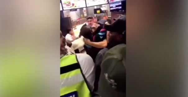 The brawl happened inside a McDonald's restaurant in London (Source: YouTube)