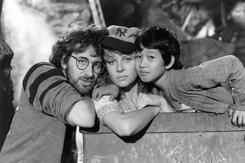 Steven Spielberg, Kate Capshaw, and Ke Huy Quan while filming 'Indiana Jones and the Temple of Doom' (IMDb)