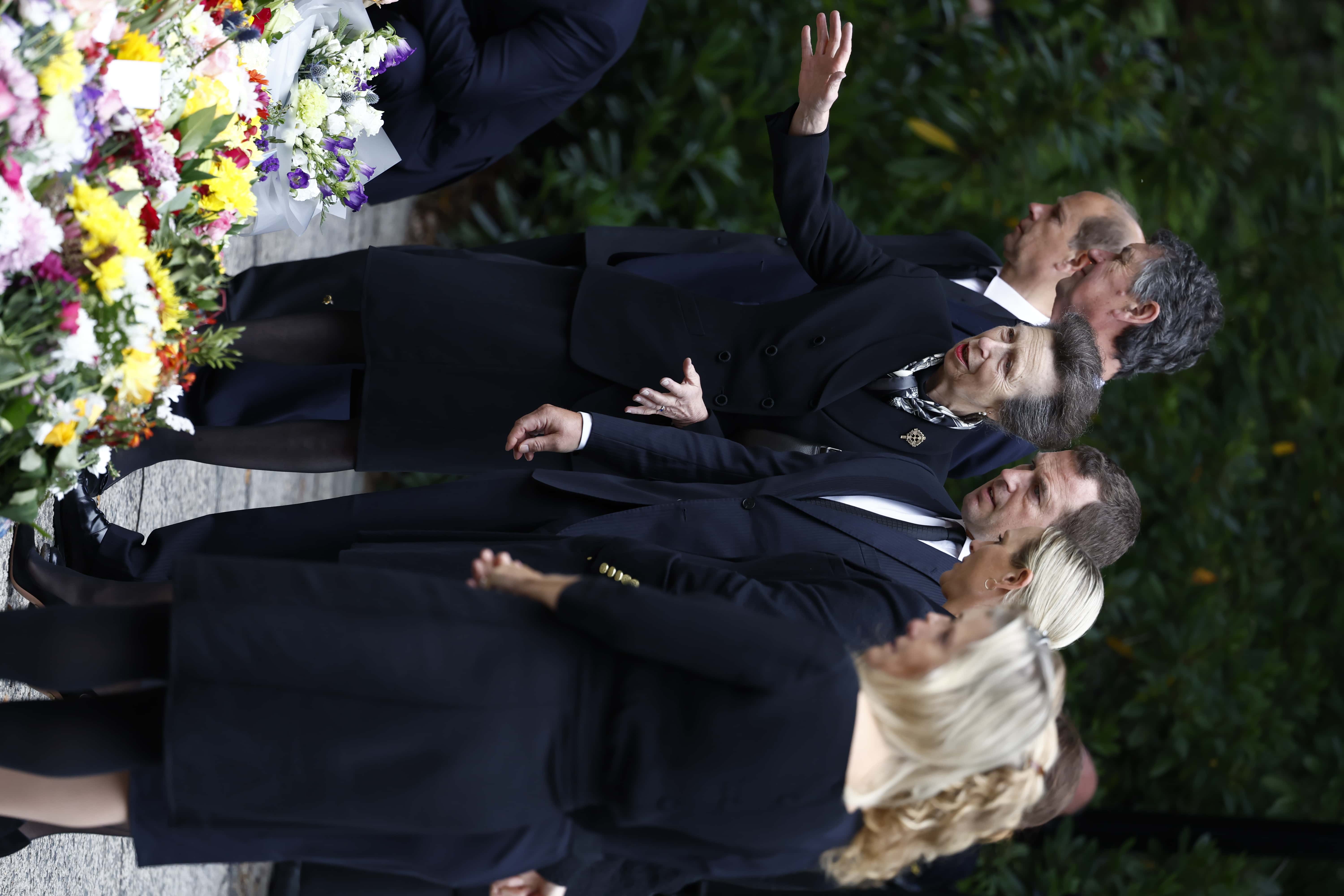 Princess Beatrice of York, Peter Phillips, Zara Tindall, Lady Louise Windsor, Sophie, Countess of Wessex, Prince Andrew, Duke of York, Edward, Earl of Wessex, Princess Anne, Princess Royal and Vice Admiral Timothy Laurence look at floral tributes outside at Crathie Kirk church on September 10, 2022 in Crathie near Aberdeen, United Kingdom. Elizabeth Alexandra Mary Windsor was born in Bruton Street, Mayfair, London on 21 April 1926. She married Prince Philip in 1947 and acceded to the throne of the United Kingdom and Commonwealth on 6 February 1952 after the death of her Father, King George VI. Queen Elizabeth II died at Balmoral Castle in Scotland on September 8, 2022, and is succeeded by her eldest son, King Charles III.