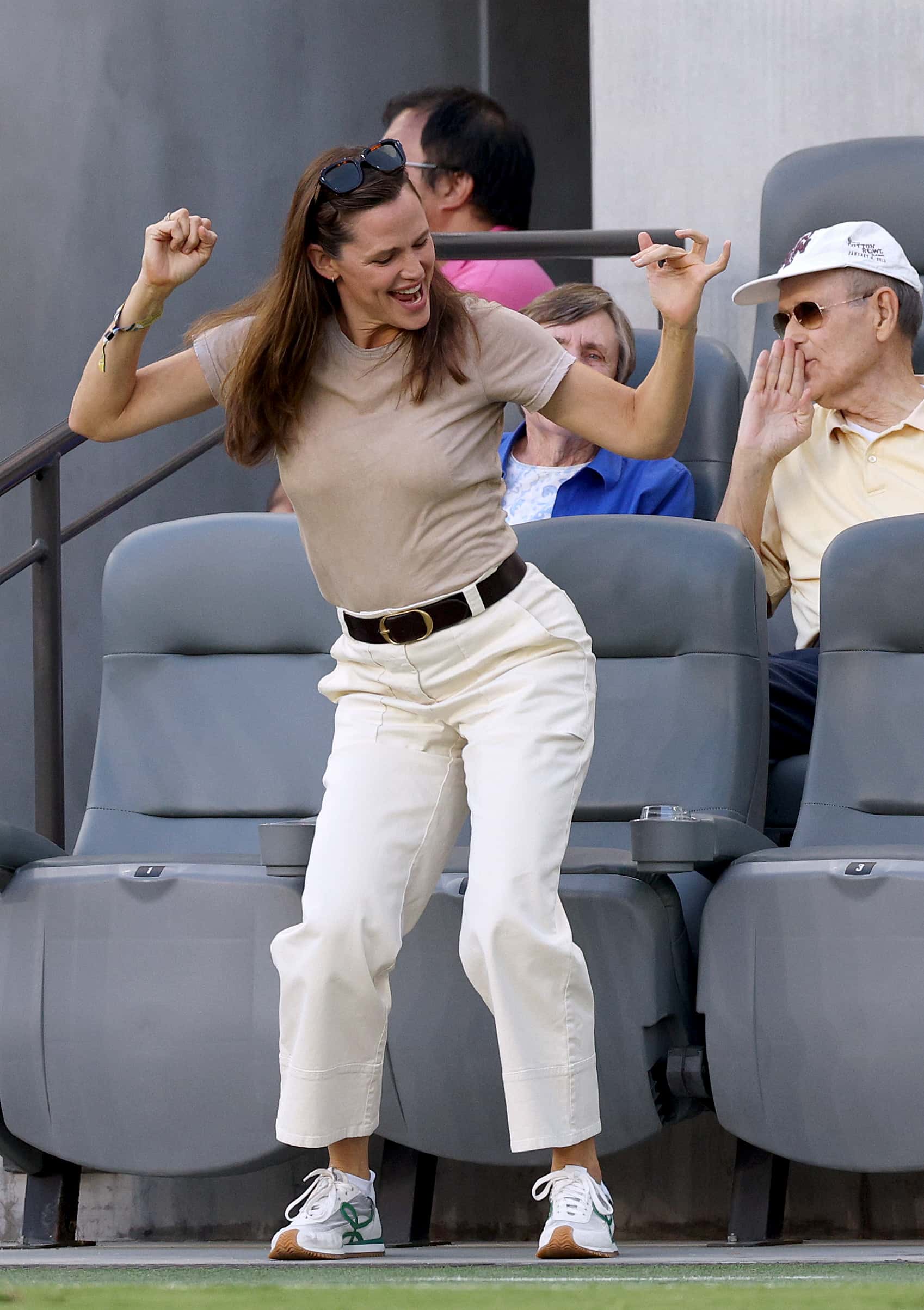 Actress Jennifer Garner dances on the field during a 2-0 Angel City FC loss to Mexico during Copa Angelina 2022 at Banc of California Stadium on September 05, 2022 in Los Angeles, California.