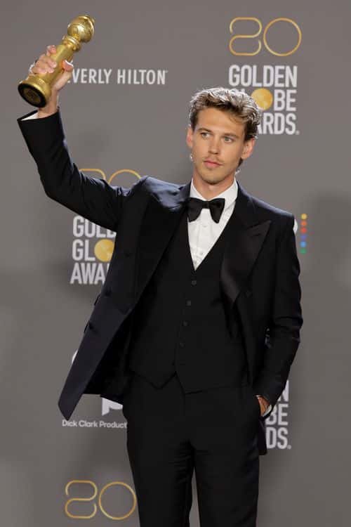 Austin Butler poses with the Best Actor in a Motion Picture – Drama award for
