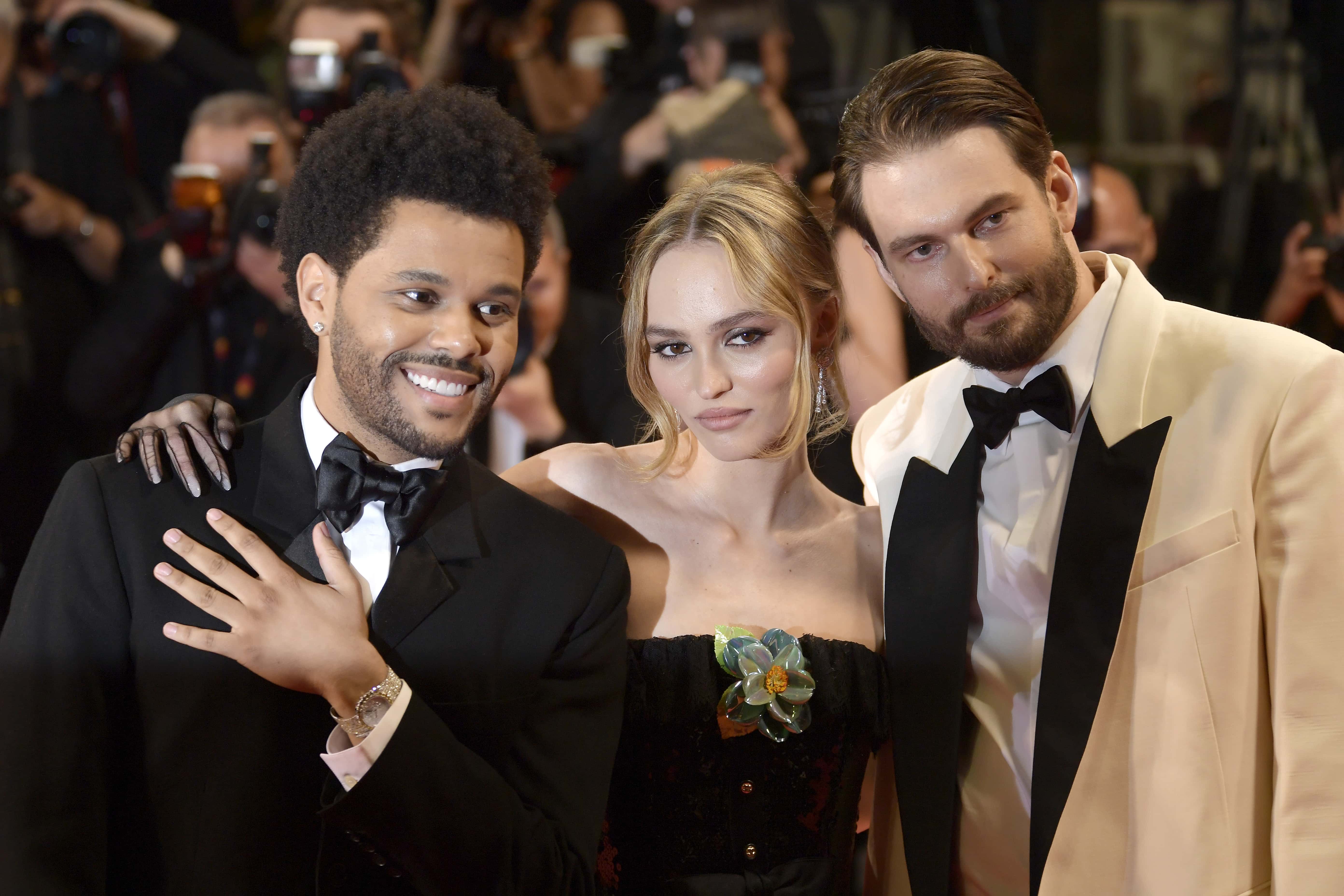 (L-R) Abel “The Weeknd” Tesfaye, Lily-Rose Depp and Sam Levinson attend the 
