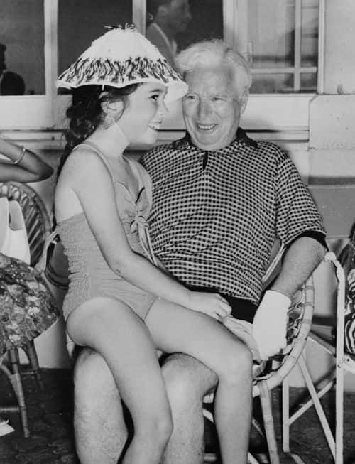 English actor and filmmaker Charlie Chaplin (1889 - 1977) with his daughter Josephine during a summer vacation at their villa in Saint-Jean-Cap Ferrat, southeastern France, 15th July 1957. (Photo by Keystone/Hulton Archive/Getty Images)