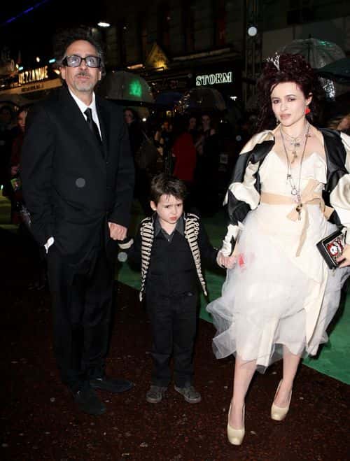 Actress Helena Bonham Carter, director Tim Burton and their son Billy Raymond arrive at the Royal World Premiere of 'Alice In Wonderland' at Odeon Leicester Square on February 25, 2010 in London, England.