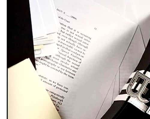 The hidden documents in the latest Balenciaga photoshoot that caused outrage on the internet (Twitter/@shoe0nhead)