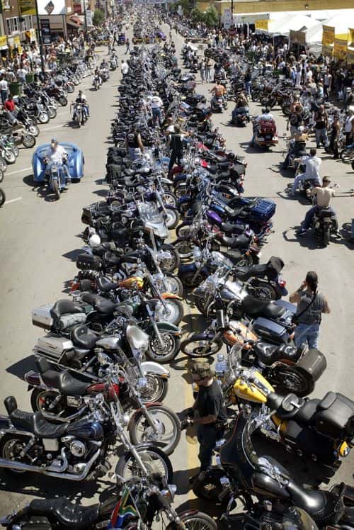 Motorcycles line the street at the annual Sturgis Motorcycle Rally August 5, 2003 in Sturgis, South Dakota. The weeklong rally attracts an estimated 500,000 people to this town of 6,000 in the southwestern corner of the state.