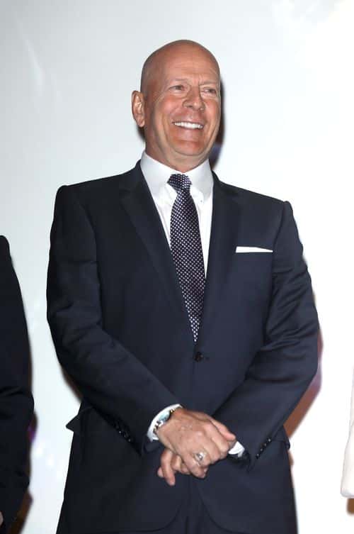Bruce Willis on stage during the UK Premiere of M. Night Shyamalan's all-new comic-book thriller