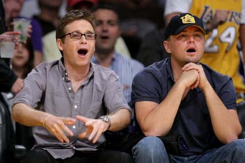 Leonardo DiCaprio (R) and Kevin Connolly (L) attend the Los Angeles Lakers vs Utah Jazz game at Staples Center on April 21, 2009 in Los Angeles, California.
