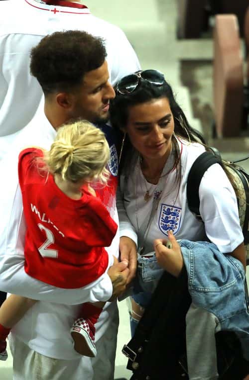 Kyle Walker of England hugs his wife Annie Kilner and his daughter following the 2018 FIFA World Cup Russia Semi Final match between England and Croatia at Luzhniki Stadium on July 11, 2018 in Moscow, Russia. (Photo by Alexander Hassenstein/Getty Images)