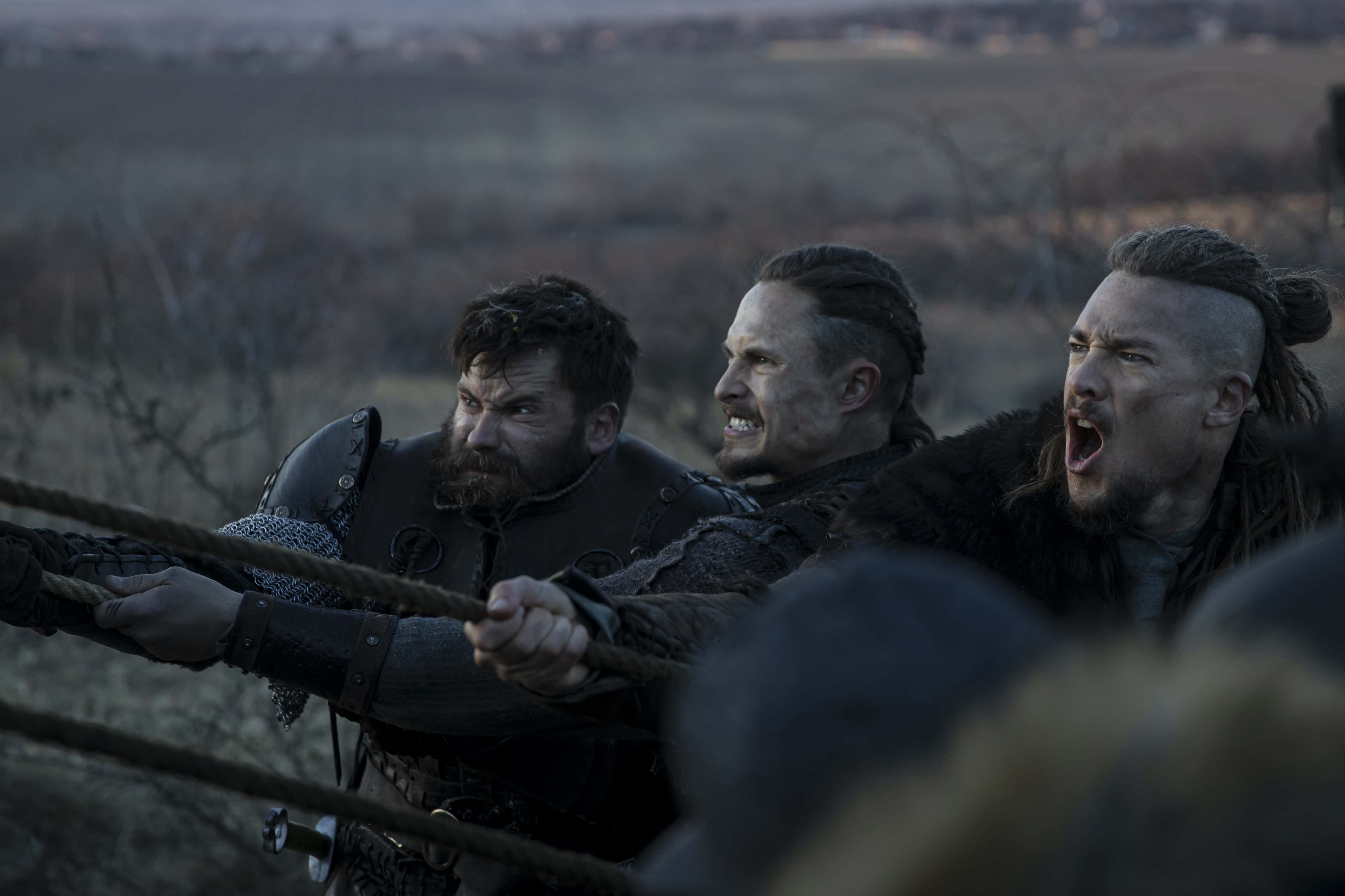 Mark Rowley as Finan, Arnas Fedaravicius as Sihtric and Alexander Dreymon in 'The Lost Kingdom: Seven Kings Must Die' (Netflix)