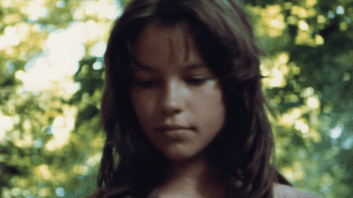 A still of younger Pamela Anderson shown in 'Pamela, A Love Story' (Netflix)