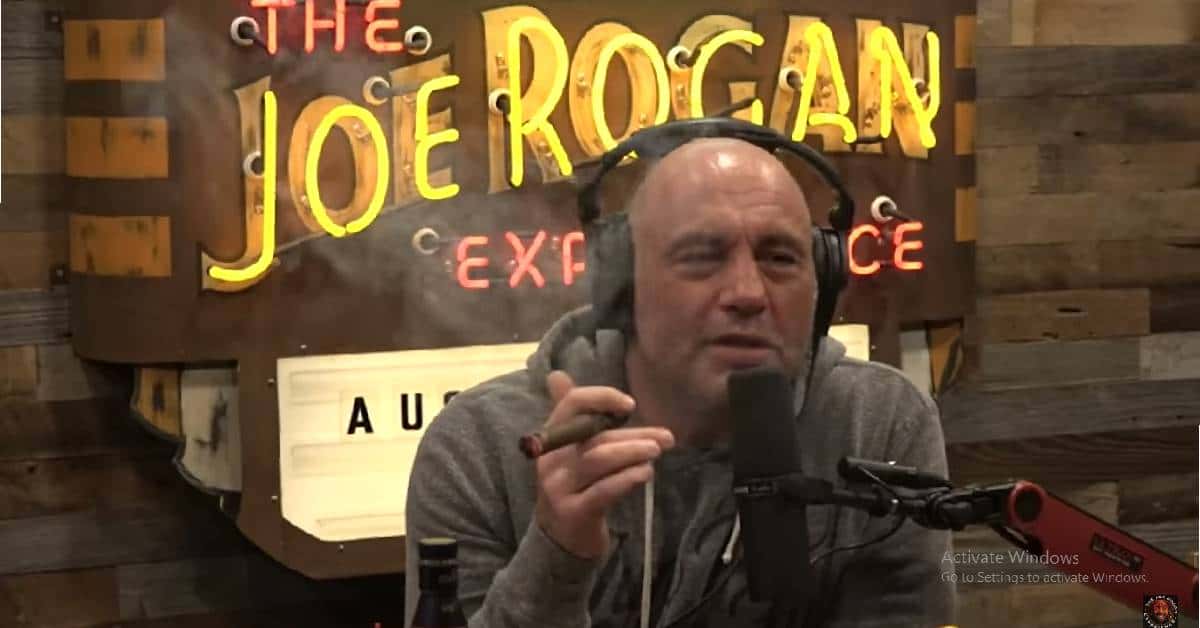 Joe Rogan smoking cigar on his podcast show (PowerfulJRE / YouTube)