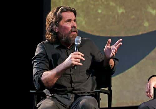 Christian Bale speaks onstage at the Amsterdam Los Angeles Special Screening at El Capitan Theatre in Hollywood, California on September 27, 2022.