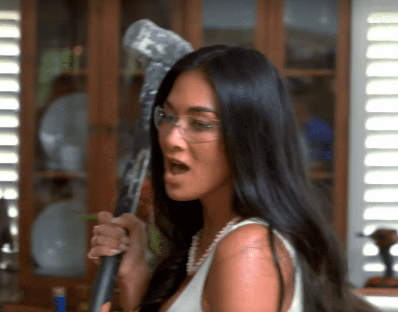 Nicole Scherzinger picks up the hammer to redecorate her Tutu and Papa's home in the finale of 'Celebrity Home Renovation' Season 2 (CBS)