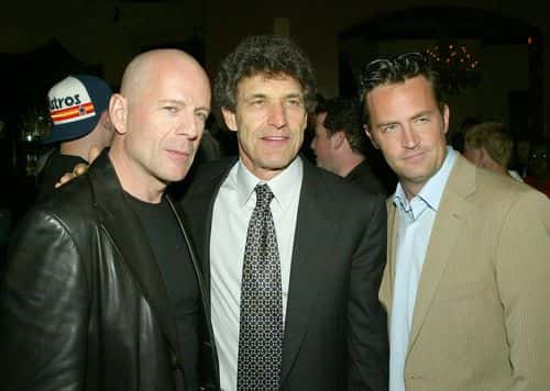 (L to R) Actor Bruce Willis, Warner Bros. Alan Horn and actor Matthew Perry pose at the after-party for the premiere of Warner Bros.