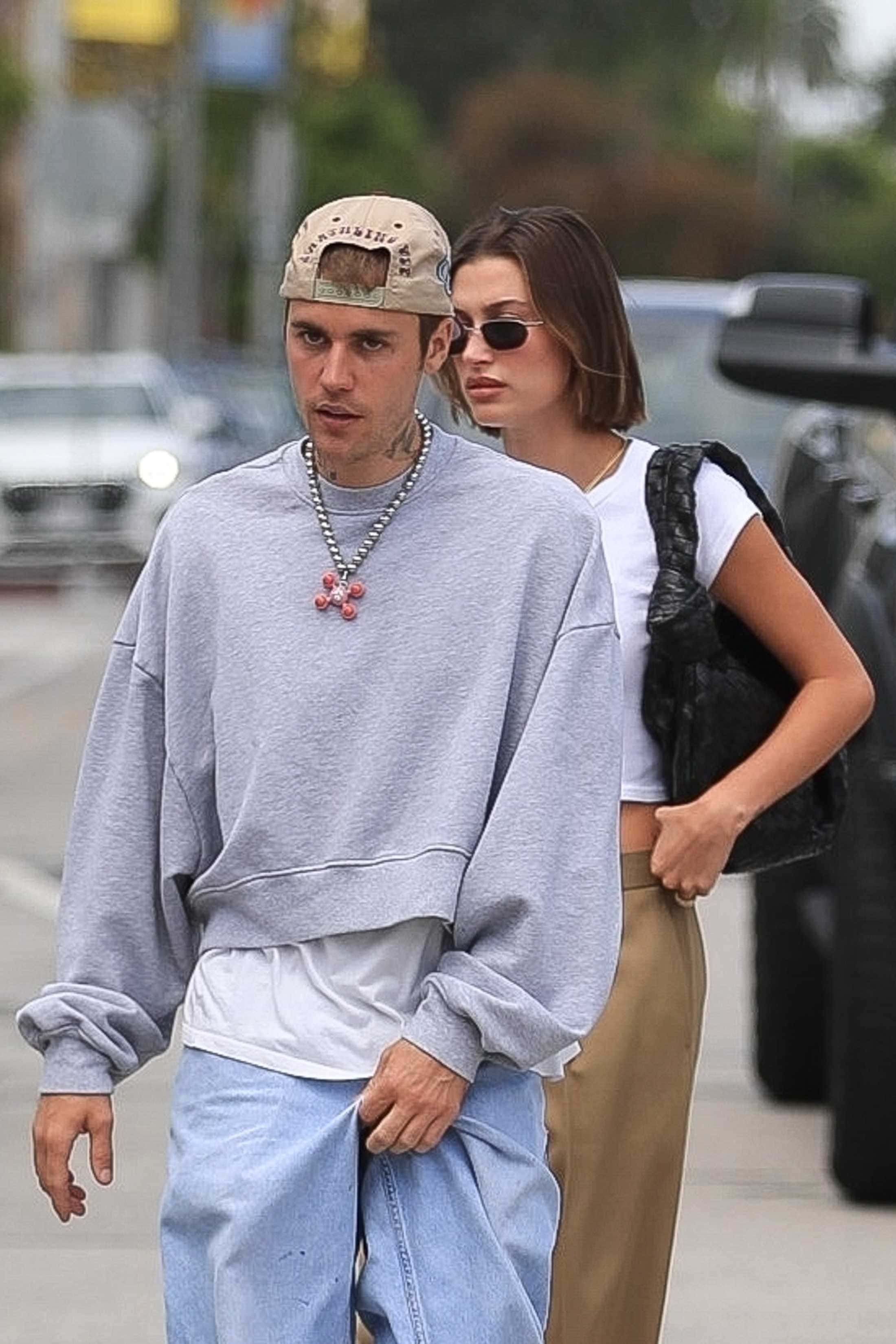 Justin Bieber was seen grabbing his crotch after having breakfast with wife Hailey (Backgrid)