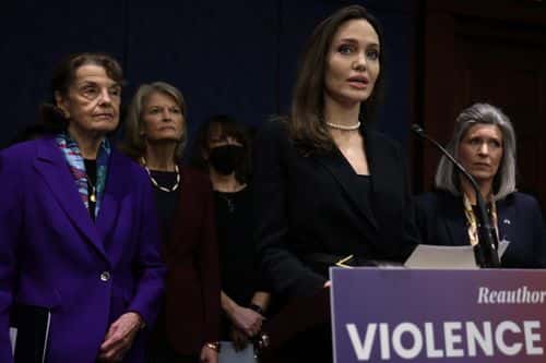 Actress Angelina Jolie speaks as (L-R) U.S. Sen. Dianne Feinstein (D-CA), Sen. Lisa Murkowski (R-AK), National Coalition Against Domestic Violence President Ruth Glenn, and Sen. Joni Ernst (R-IA) listen during a news conference at the U.S. Capitol February 9, 2022 in Washington, DC. A group of bipartisan U.S. senators held a news conference to announce a bipartisan modernized Violence Against Women Act (VAWA).