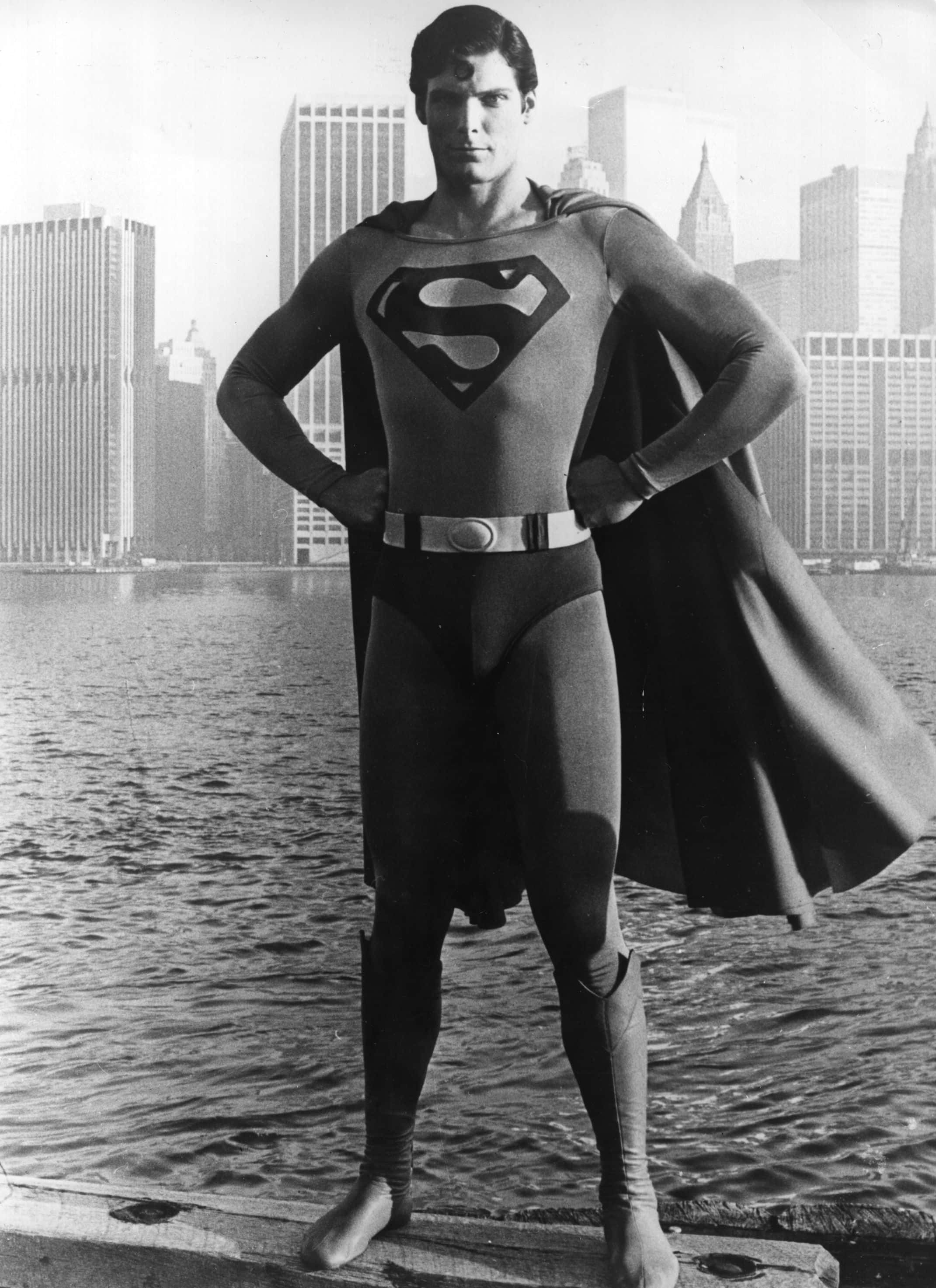 24-year-old American film actor Christopher Reeve stands before the Manhattan skyline dressed as the comic-book hero of the film 'Superman'. (Photo by Keystone/Getty Images)
