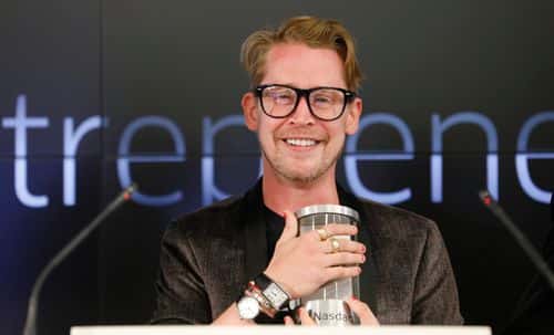 Macaulay Culkin, co-founder of lifestyle media Bunny Ears, is the honorary bell ringers of the Nasdaq Closing Bell from the Nasdaq Entrepreneurial Center on August 6, 2019 in San Francisco, California. They were joined by the graduating class of the Lehigh Startup Academy and Jeff Thomas of Nasdaq (Back L) (Photo by Kimberly White/Getty Images for Nasdaq Entrepreneurial Center)