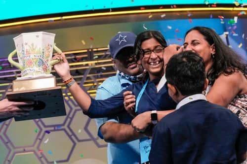 14-year-old Harini Logan from San Antonio, Texas is embraced by family after winning the Scripps National Spelling Bee at the Gaylord National Harbor Resort on June 2, 2022 in Oxon Hill, Maryland.&nbsp;234 spellers are competing in the first fully in-person Bee since 2019.