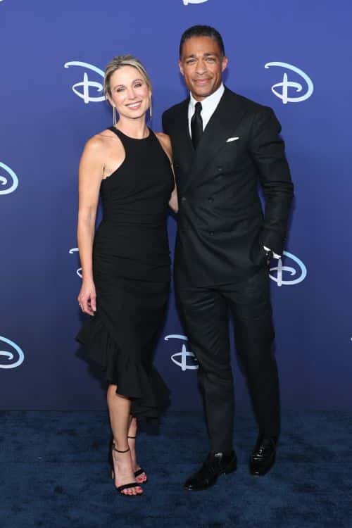 Amy Robach and TJ Holmes attend the 2022 ABC Disney Upfront at Basketball City - Pier 36 - South Street on May 17, 2022 in New York City.