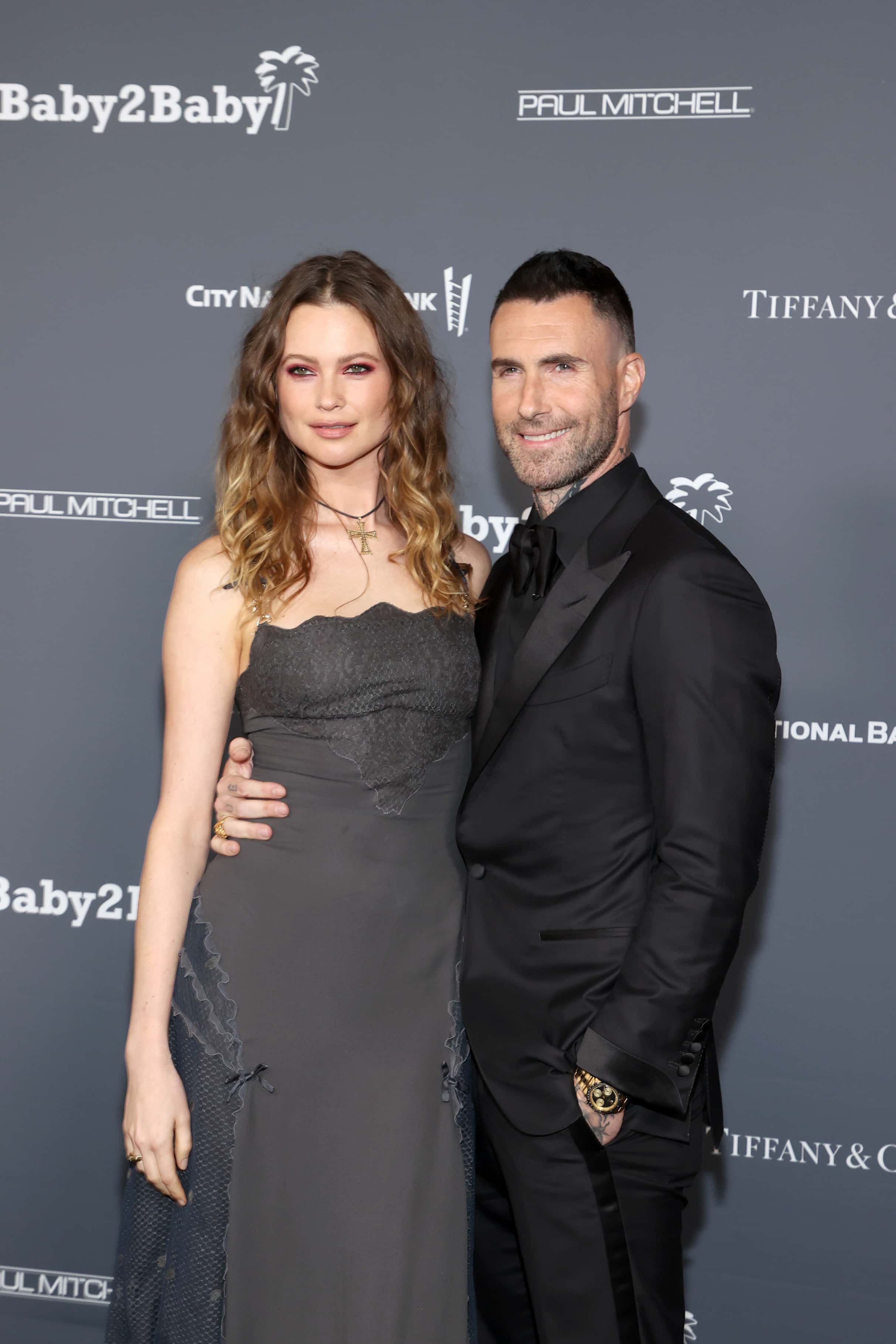(L-R) Behati Prinsloo and Adam Levine attend the Baby2Baby 10-Year Gala presented by Paul Mitchell on November 13, 2021 in West Hollywood, California. (Photo by Amy Sussman/Getty Images for Baby2Baby)