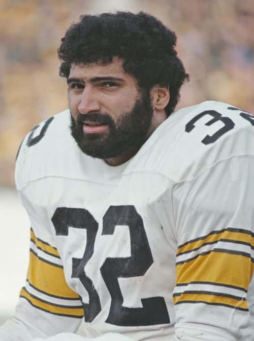 Franco Harris #32, Running back for the Pittsburgh Steelers during the NFL/AFC Divisional playoff game on 19 December 1976 at the Memorial Stadium, Baltimore, Maryland, United States. The Steelers won the game 40 - 14. (Photo by Bob Grieser/Allsport/Getty Images)