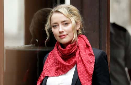 Amber Heard arrives at the Royal Courts of Justice, the Strand on July 24, 2020 in London, England. Hollywood actor Johnny Depp is suing News Group Newspapers (NGN) and the Sun's executive editor, Dan Wootton, over an article published in 2018 that referred to him as a 