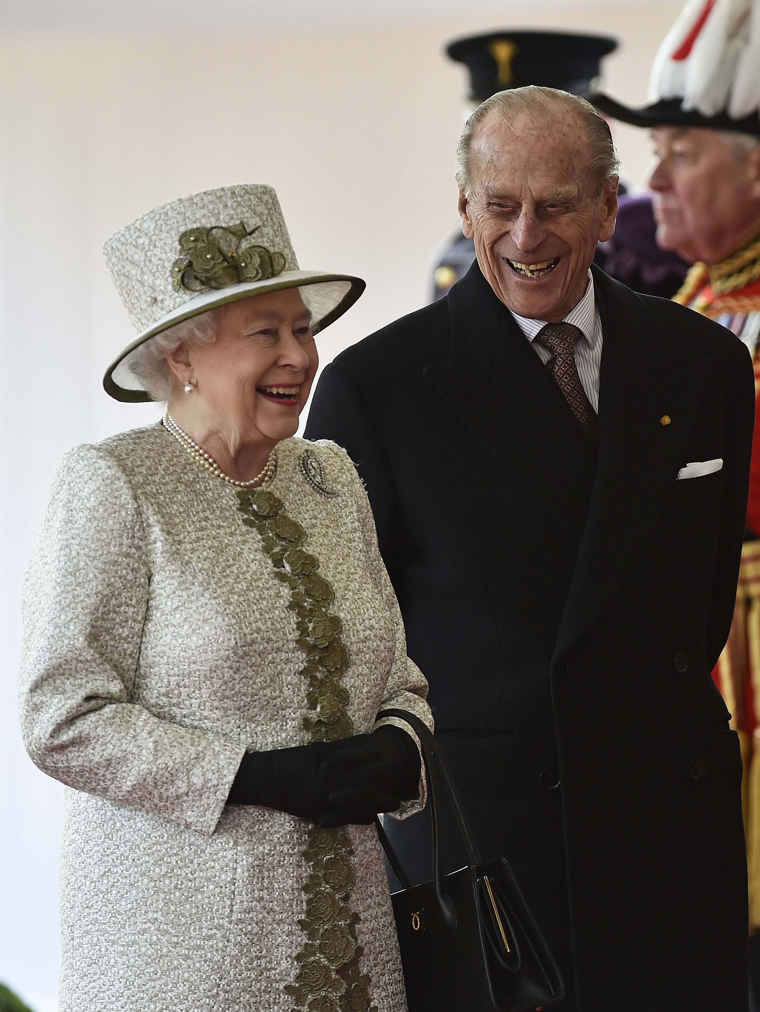 Queen Elizabeth II and Prince Philip, Duke of Edinburgh laugh during a ceremonial welcome for the State Visit of The President of The United Mexican, Senor Enrique Pena Nieto and Senora Rivera at Horse Guards Parade on March 3, 2015 in London, England.  The Ceremony marks the start of a three day visit to Britain.