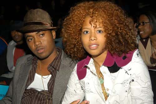 (US TABS AND HOLLYWOOD REPORTER OUT) Rappers Nas (L) and Kelis appear at the Baby Phat Spring/Summer 2004 Collection fashion show September 13, 2003 in Bryant Park in New York City.