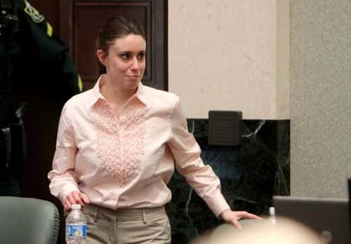 Casey Anthony smiles as she returns to the defense table after being acquitted of murder charges at the Orange County Courthouse on July 5, 2011 in Orlando, Florida. Casey Anthony had been accused of murdering her two-year-old daughter Caylee in 2008 and was found not guilty of manslaughter in the first degree.