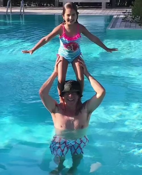 Compiled in a video, the pictures showed Mabel through the years sitting on her father's shoulders and sharing bonding experiences with him (emmahemmingwillis)